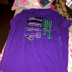 Purple Nike shirt